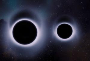 Астрономи заснеха за първи път две черни дупки, които се въртят една около друга